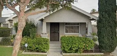 <p>Design a picturesque, modern farmhouse-style small-family-sized house facade, measuring about 25x35 feet. The main entrance is in the middle, flanked by large windows that draw in a lot of sunlight. The facade incorporates a blend of grey stone and white-painted wood. Exposed wooden beams accentuate the roof overhang. A compact, inviting porch features contemporary outdoor furniture, with decorative flora adding to the charm. The house is set within well-tended greenery and flowerbeds, with a path leading to a state-of-the-art front door having frosted glass embellishments. Install faint modern outdoor lighting and a stylish, minimal house numbering.</p>