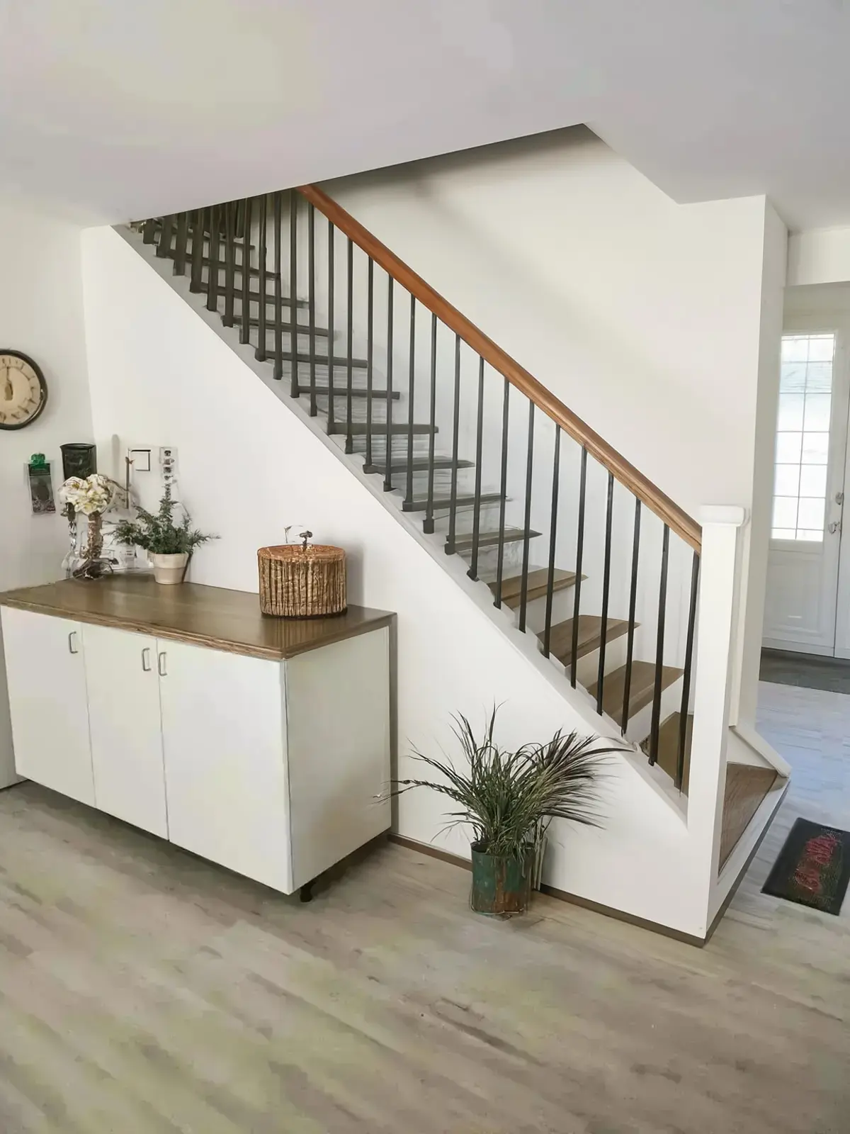 Mid-Century Modern Hallway Remodel with White Railing & Black Spindles