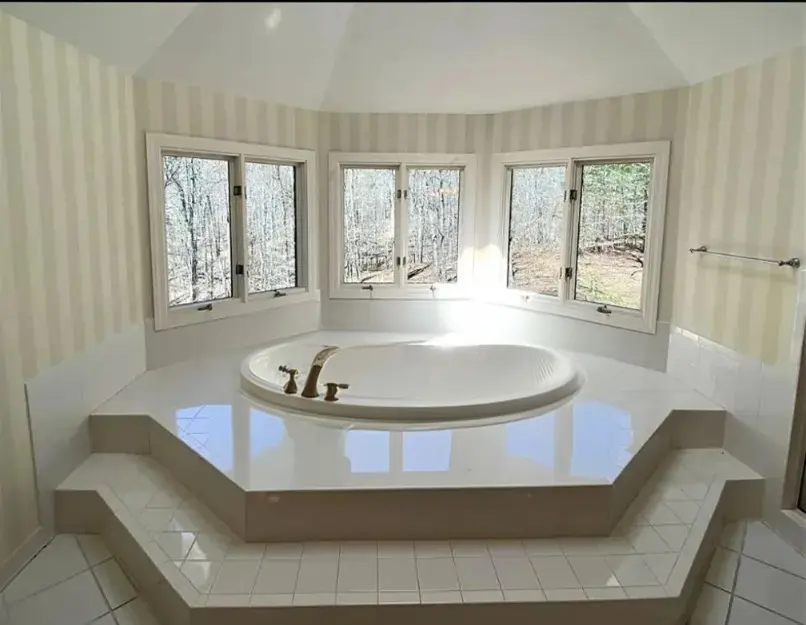 Elegant Traditional Bathroom Redesign with Walk-in Shower and Freestanding Tub