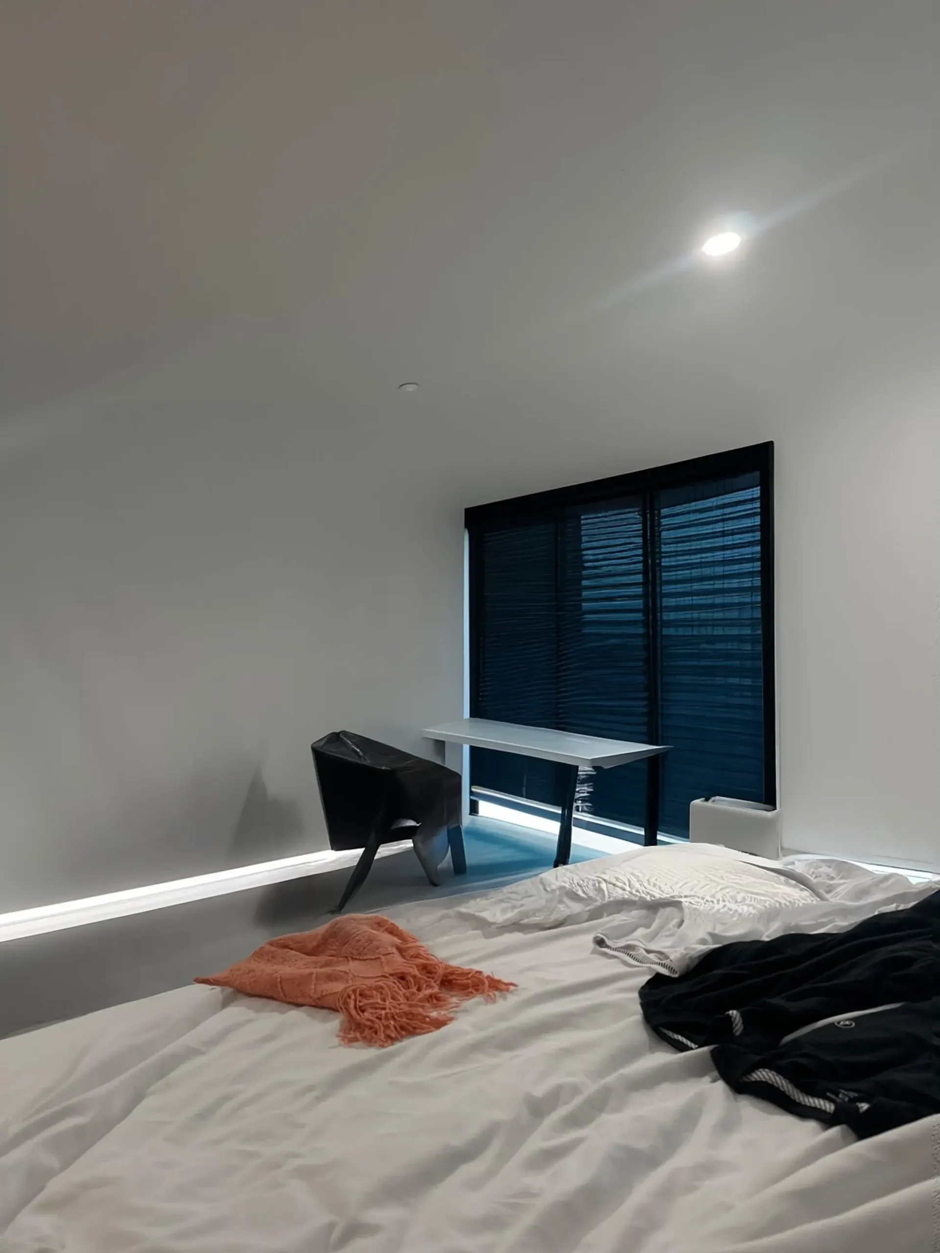 Modern Minimalist Bedroom Remodel with Workspace and Reading Nook