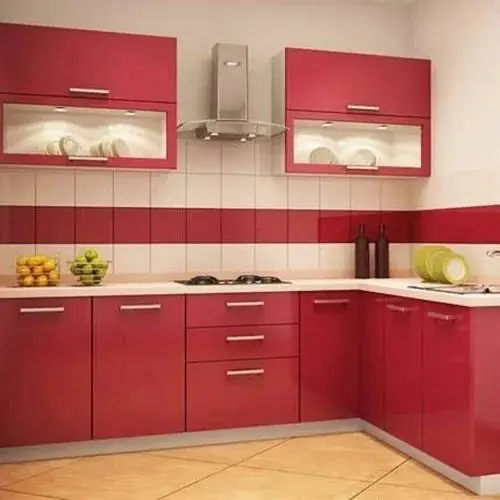 <p>Design a modern kitchen area of dimensions 12ft by 10ft. Incorporate glossy red cabinets with brushed metal handles and white quartz countertops. The kitchen should have a high-quality stainless steel gas stovetop with a matching cooker hood, and a built-in oven in the lower cabinets. The kitchen should have under-cabinet LED lights and a white subway tile backsplash with a decorative red mosaic strip. Add floating wooden shelves for decor and an herb garden planter near a window on the countertop. Include pull-out pantry shelves and built-in space for a microwave in the lower cabinets. Include a small breakfast bar with two high stools for a efficient, clean, and welcoming environment.</p>