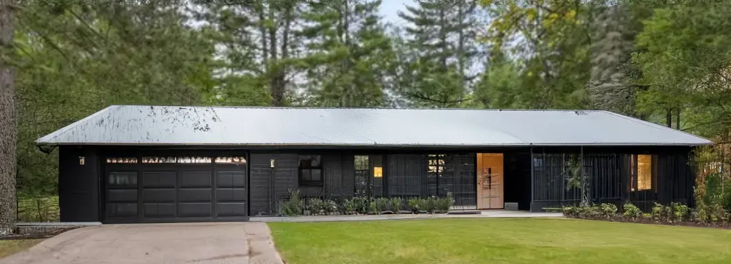 Rustic Exterior Remodel: Achieve Charm with Black and Wood Accents