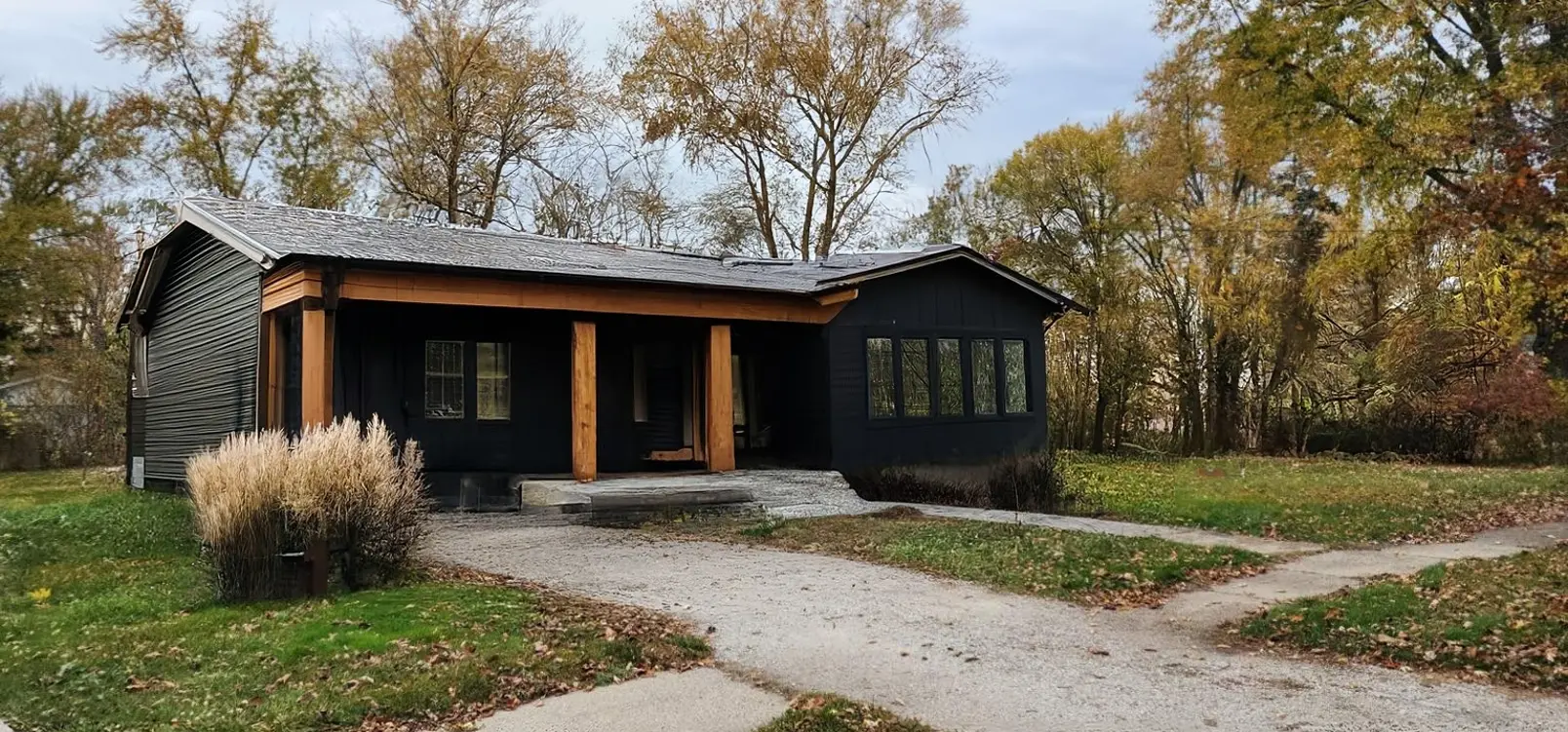 Modern Exterior Remodel with Porch and Fencing