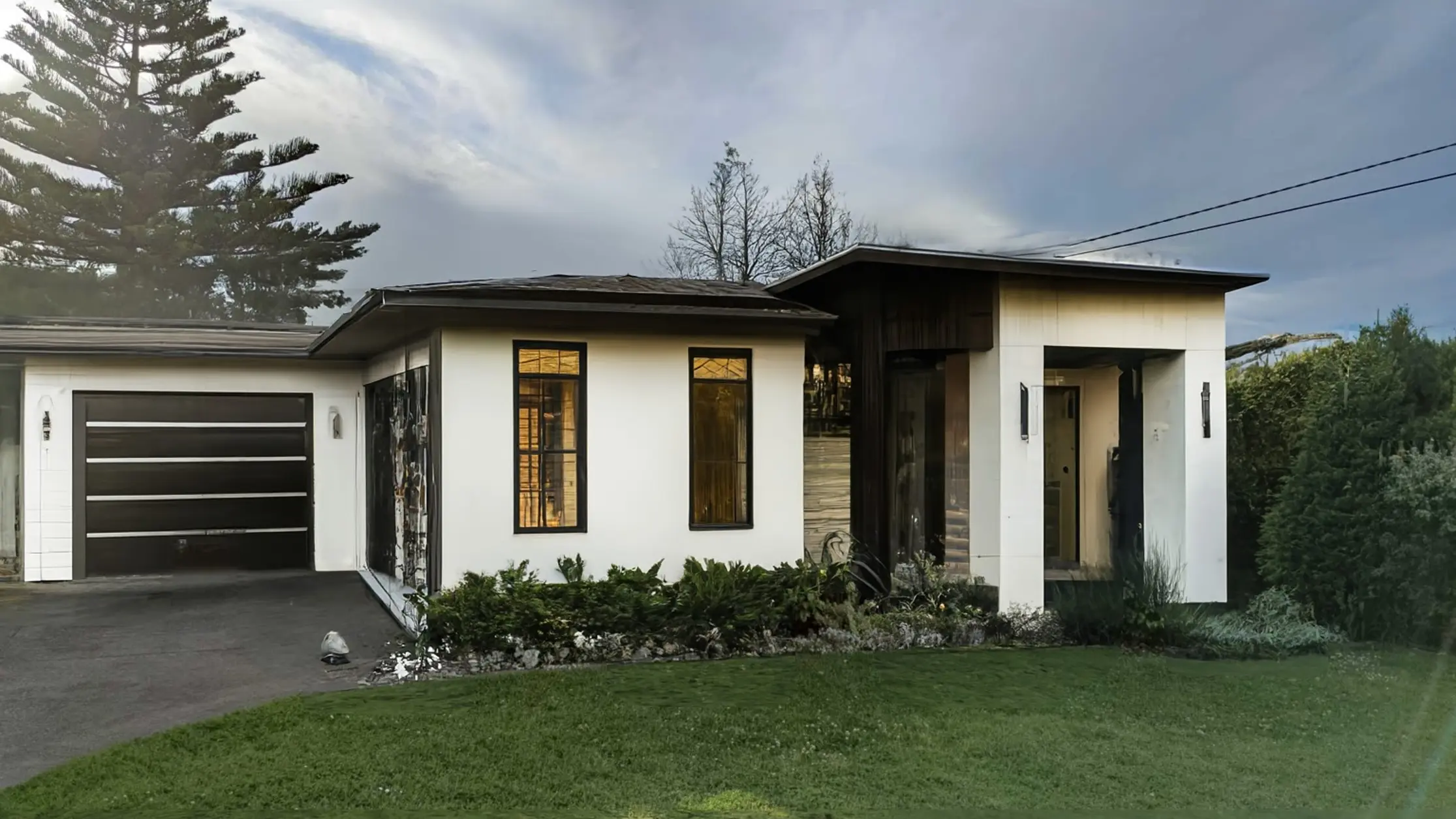 Modern Exterior Home Remodel with Black Accents