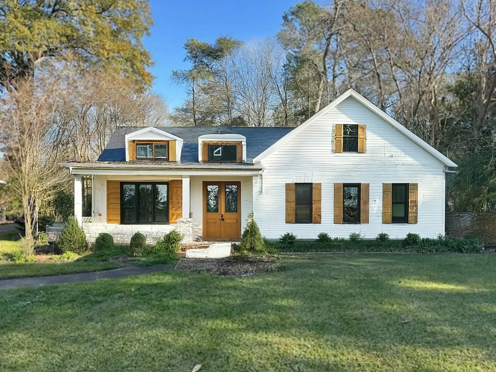 Modern Exterior Home Remodel with Natural Wood Accents