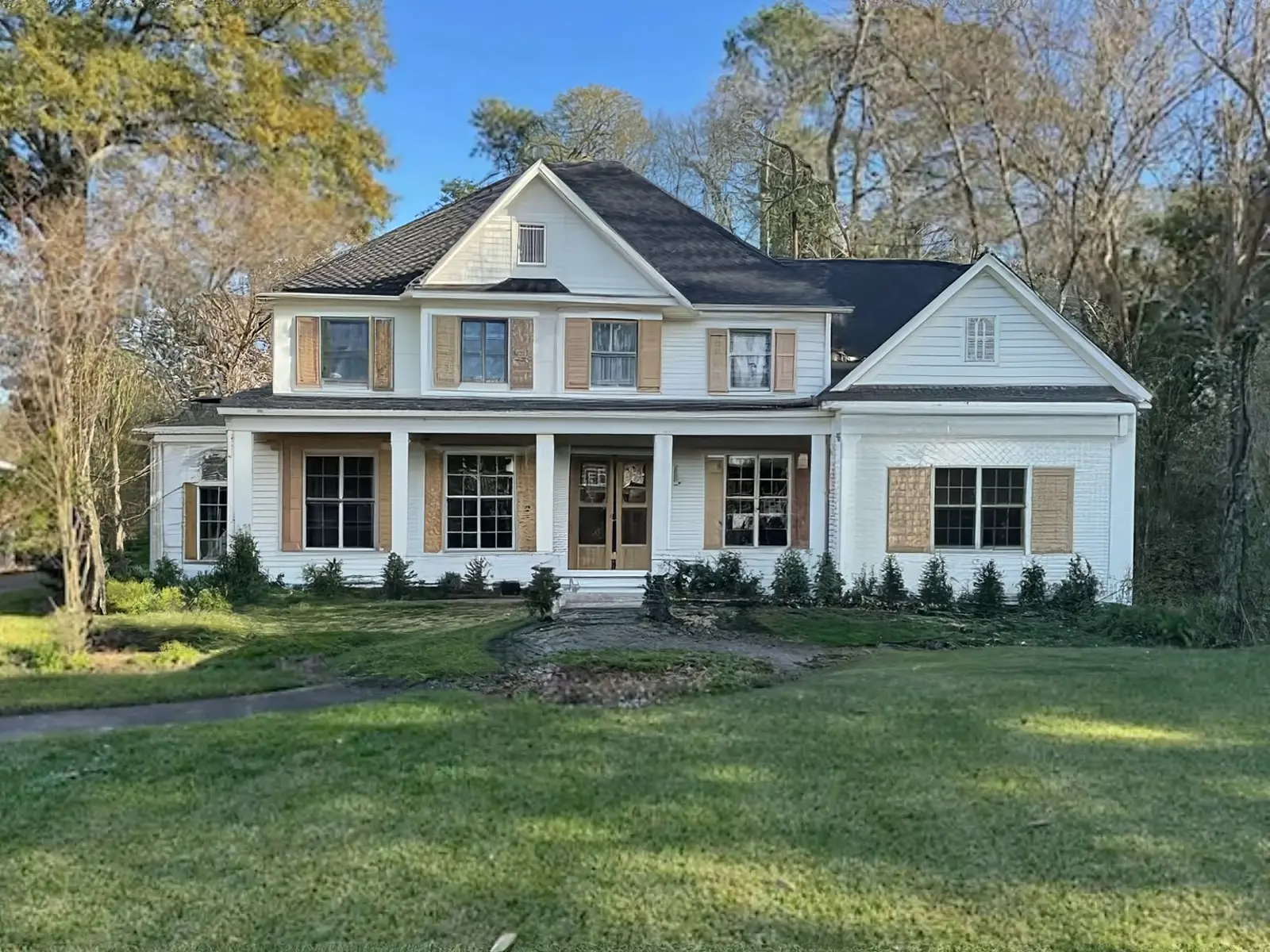 Traditional Exterior Facade Remodel with Oak Accents