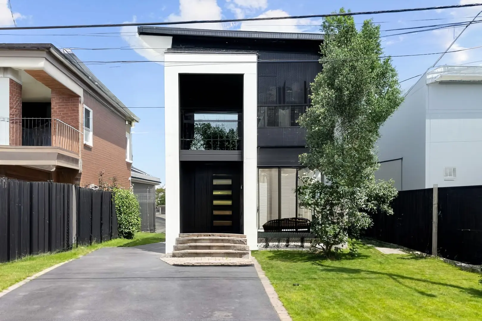 Modern Exterior Remodel with Black and Wood Design